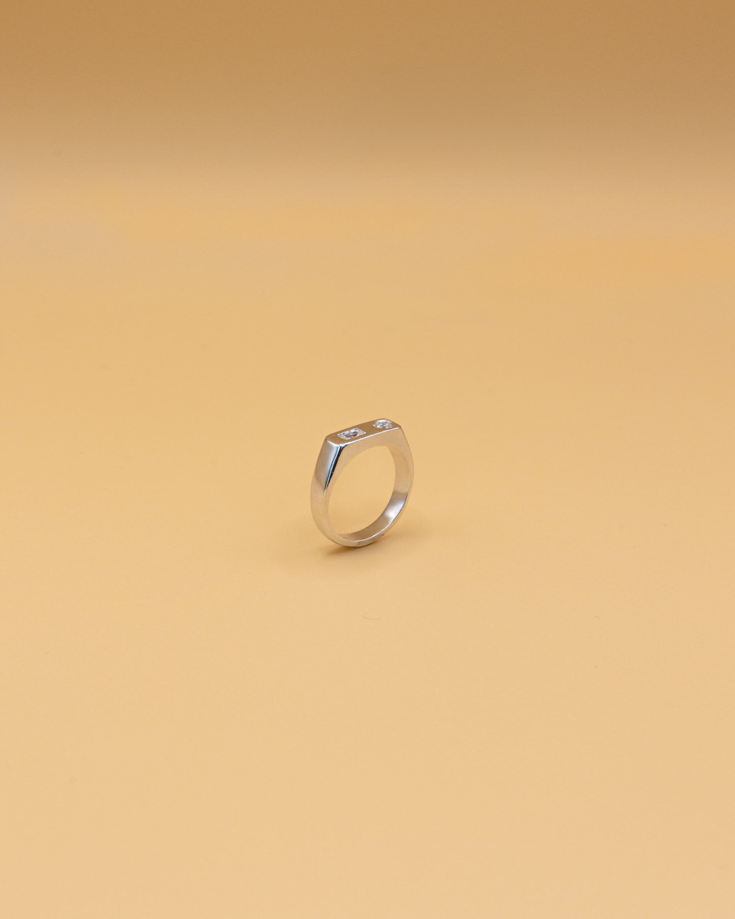 Dual stone ring in silver by Beurre d'Or