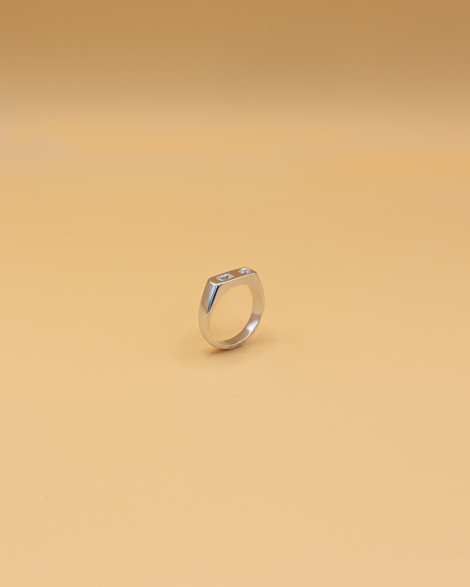 Dual stone ring in silver by Beurre d'Or